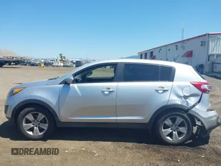 2013 Kia Sportage LX with VIN KNDPBCA24D7352828, listed as a IAAI auction lot 42685744 with 156,805 mi miles and . Bid and sale history available at DreamBid. Image 14.