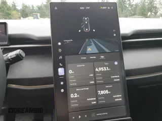 2023 Fisker Ocean One z VIN VCF1ZBU2XPG003443, wystawiony jako Copart lot #50072055 z przebiegiem 7805 mil mil oraz Szkody całkowita. Historia ofert i sprzedaży dostępna na DreamBid. Obrazek 9.
