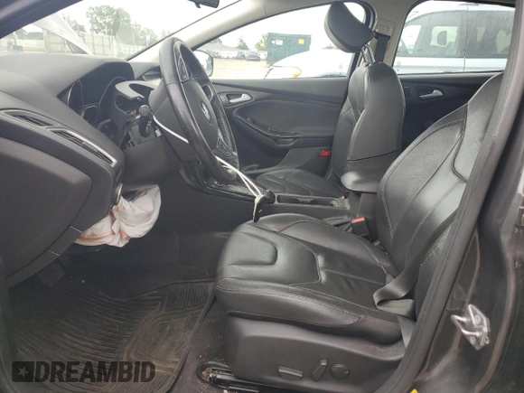 2015 Ford Focus Titanium с VIN 1FADP3J21FL254702, выставлен на аукционе Copart как лот 59872395 с пробегом 93 195 миль миль и Списание • Salvage title. История ставок и продаж доступна на DreamBid. Изображение 7.