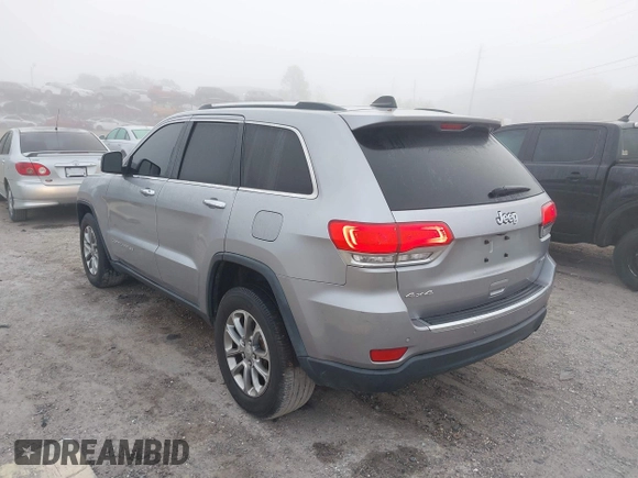 2015 Jeep Grand Cherokee Limited with VIN 1C4RJFBG5FC732732, listed as a IAAI auction lot 41478553 with 174,842 mi miles. Bid and sale history available at carsss.com. Image 3.