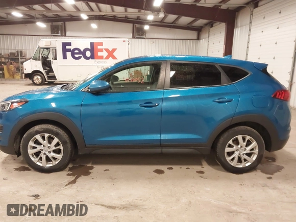 2019 Hyundai Tucson SE with VIN KM8J2CA48KU027746, listed as a IAAI auction lot 41986052 with 93,261 mi miles. Bid and sale history available at carsss.com. Image 15.