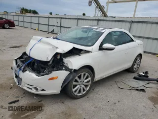 2009 Volkswagen Eos Komfort with VIN WVWBA71FX9V014635, listed as a Copart auction lot 58415885 with 90,494 mi miles and Salvage title. Bid and sale history available at DreamBid. Image 1.
