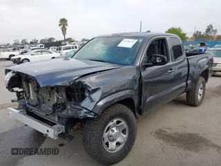 2022 Toyota Tacoma SR with VIN 3TYSX5EN8NT016817, listed as a IAAI auction lot 42140136 with 52,825 mi miles and . Bid and sale history available at DreamBid. Image 2.
