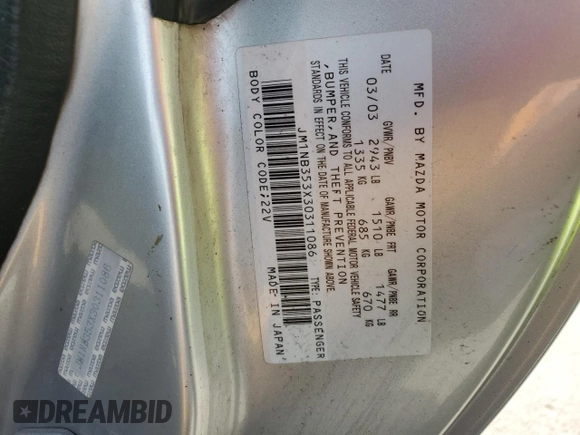 2003 Mazda MX-5 Miata Cloth z VIN JM1NB353X30311086, wystawiony jako Copart lot #57685445 z przebiegiem 141 634 mil mil oraz Szkoda całkowita • Salvage title. Historia ofert i sprzedaży dostępna na DreamBid. Obrazek 12.