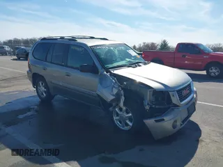 2002 GMC Envoy SLT z VIN 1GKDT13S122114452, wystawiony jako IAAI lot #42048616 z przebiegiem 259 545 mil mil oraz . Historia ofert i sprzedaży dostępna na DreamBid. Obrazek 6.