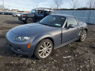 2008 Mazda MX-5 Miata Grand Touring z VIN JM1NC26F380153309, wystawiony jako Copart lot #88280775 z przebiegiem 42 069 mil mil oraz Szkoda całkowita • Salvage title. Historia ofert i sprzedaży dostępna na DreamBid. Obrazek 1.