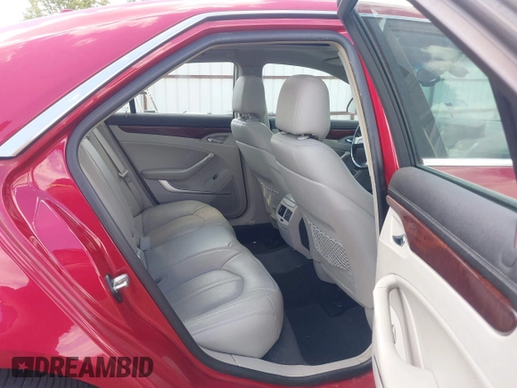 2012 Cadillac CTS Premium z VIN 1G6DS5E31C0104841, wystawiony jako IAAI lot #42292295 z przebiegiem 124 477 mil mil oraz . Historia ofert i sprzedaży dostępna na DreamBid. Obrazek 8.