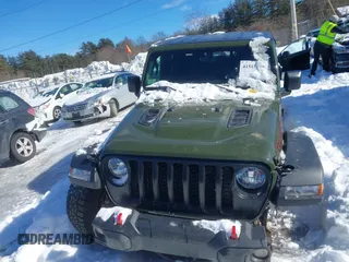 2023 Jeep Gladiator Rubicon with VIN 1C6JJTBG6PL576818, listed as a IAAI auction lot 41515428 with 10,271 mi miles and . Bid and sale history available at DreamBid. Image 12.