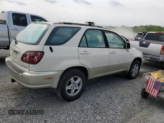 1999 Lexus RX 300 with VIN JT6HF10U7X0009824, listed as a Copart auction lot 52953135 with 180,006 mi miles and Salvage Title. Bid and sale history available at DreamBid. Image 3.