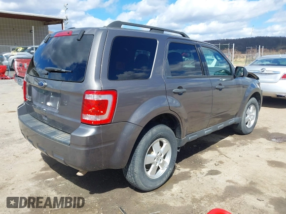 2012 Ford Escape XLT with VIN 1FMCU0D76CKC01916, listed as a IAAI auction lot 41879331 with 194,201 mi miles. Bid and sale history available at carsss.com. Image 4.