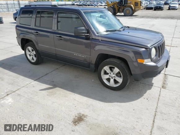 2014 Jeep Patriot Latitude with VIN 1C4NJRFB1ED727017, listed as a Copart auction lot 61660885 with 151,097 mi miles and Salvage title. Bid and sale history available at DreamBid. Image 4.
