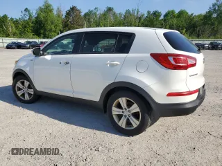 2012 Kia Sportage LX with VIN KNDPBCA21C7233424, listed as a Copart auction lot 61829465 with 129,526 mi miles and Salvage title. Bid and sale history available at DreamBid. Image 2.