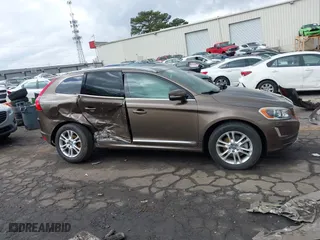 2015 Volvo XC60 T5 Drive-E Premier with VIN YV440MDK8F2681703, listed as a IAAI auction lot 41730228 with 112,738 mi miles. Bid and sale history available at carsss.com. Image 13.