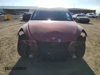 2024 Tesla Model Y Long Range with VIN 7SAYGDEE4RA257722, listed as a Copart auction lot 54577865 with 10,713 mi miles and Salvage Title. Bid and sale history available at DreamBid. Image 5.