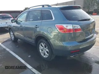 2011 Mazda CX-9 Touring z VIN JM3TB3CV6B0308283, wystawiony jako IAAI lot #41739538 z przebiegiem 96 507 mil mil oraz . Historia ofert i sprzedaży dostępna na DreamBid. Obrazek 3.