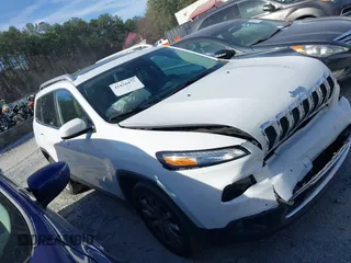 2015 Jeep Cherokee Limited with VIN 1C4PJLDB9FW677367, listed as a IAAI auction lot 41826477 with 125,648 mi miles and . Bid and sale history available at DreamBid. Image 13.
