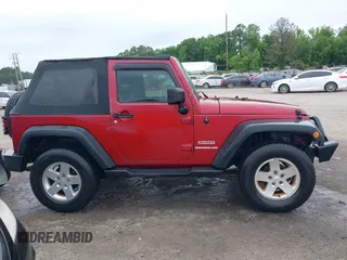 2012 Jeep Wrangler Sport with VIN 1C4AJWAG3CL197295, listed as a IAAI auction lot 42349118 with 117,381 mi miles and . Bid and sale history available at DreamBid. Image 13.