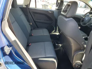 2009 Dodge Caliber SXT with VIN 1B3HB48A99D157051, listed as a Copart auction lot 52098965 with 188,268 mi miles and Salvage Title. Bid and sale history available at carsss.com. Image 10.