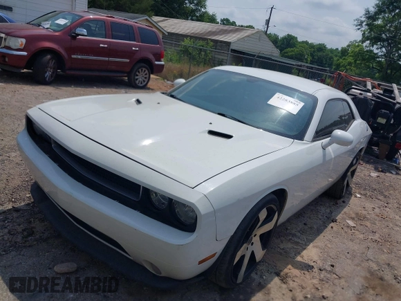 2012 Dodge Challenger SXT Plus z VIN 2C3CDYAG3CH168263, wystawiony jako IAAI lot #42283885 z przebiegiem 200 052 mil mil oraz . Historia ofert i sprzedaży dostępna na DreamBid. Obrazek 18.