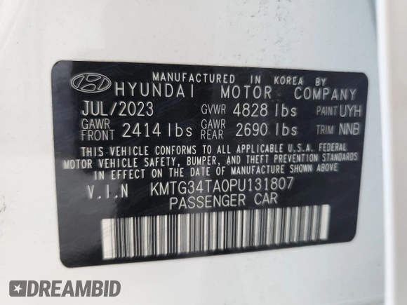 2023 Genesis G70 2.0T with VIN KMTG34TA0PU131807, listed as a Copart auction lot 66194774 with 12,185 mi miles and Salvage Title. Bid and sale history available at DreamBid. Image 12.