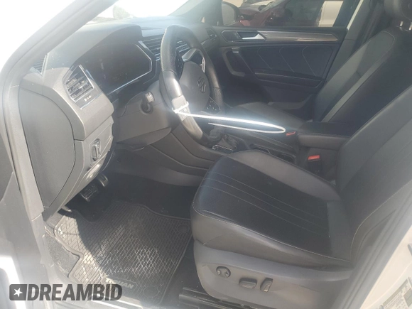 2022 Volkswagen Tiguan SE R-Line Black with VIN 3VVCB7AX8NM009403, listed as a Copart auction lot 52720885 with 74,063 mi miles and Salvage title. Bid and sale history available at DreamBid. Image 7.