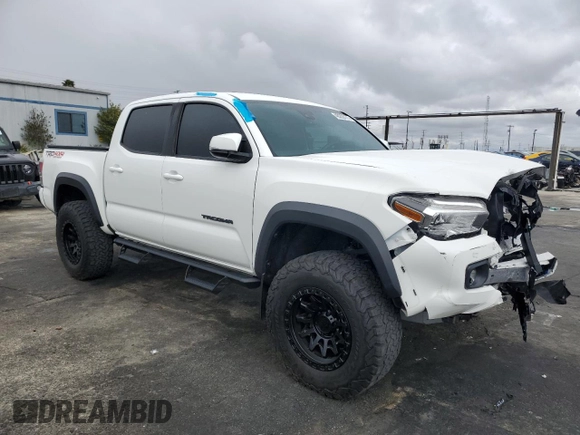 2021 Toyota Tacoma 4WD SR with VIN 3TMCZ5AN5MM431429, listed as a Copart auction lot 48203175 with 22,108 mi miles and Salvage Title. Bid and sale history available at carsss.com. Image 4.
