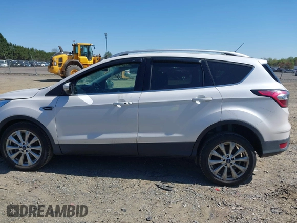 2017 Ford Escape Titanium with VIN 1FMCU9J96HUE21191, listed as a IAAI auction lot 42006013 with 71,786 mi miles. Bid and sale history available at carsss.com. Image 14.