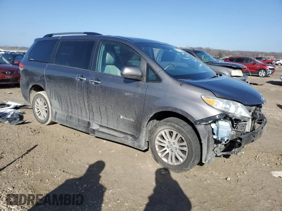 2014 Toyota Sienna XLE with VIN 5TDYK3DC5ES431148, listed as a Copart auction lot 43571065 with 82,854 mi miles and Salvage Title. Bid and sale history available at carsss.com. Image 4.