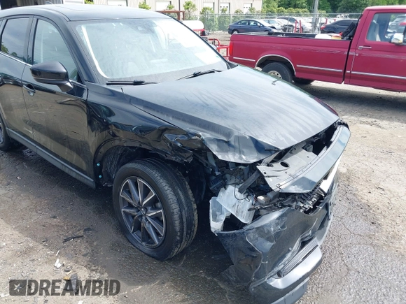 2018 Mazda CX-5 Grand Touring z VIN JM3KFBDM5J0307785, wystawiony jako IAAI lot #42302609 z przebiegiem 81 974 mil mil oraz . Historia ofert i sprzedaży dostępna na DreamBid. Obrazek 6.