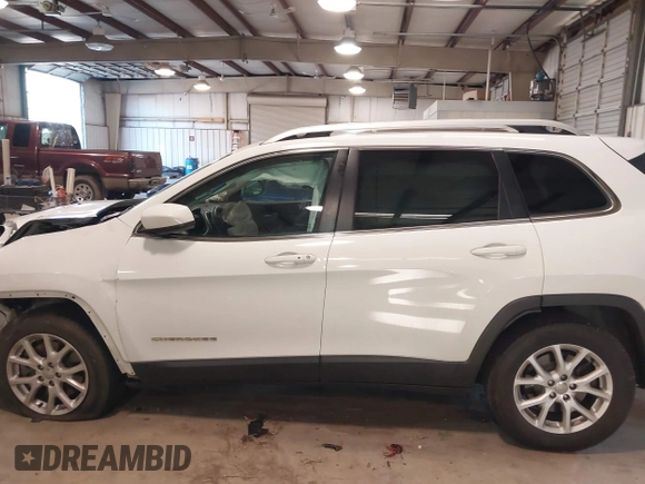 2017 Jeep Cherokee Latitude with VIN 1C4PJLCS7HW549570, listed as a IAAI auction lot 41276093 with 135,664 mi miles and . Bid and sale history available at carsss.com. Image 14.