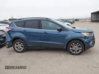 2018 Ford Escape SE with VIN 1FMCU0GD0JUC58115, listed as a IAAI auction lot 41578309 with 76,162 mi miles. Bid and sale history available at carsss.com. Image 13.