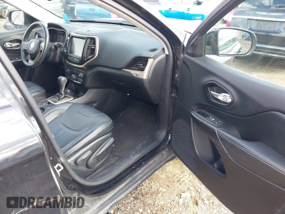 2014 Jeep Cherokee Limited with VIN 1C4PJMDS3EW211129, listed as a IAAI auction lot 41877310 with 91,791 mi miles and . Bid and sale history available at DreamBid. Image 5.
