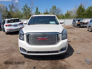 2015 GMC Yukon Denali with VIN 1GKS1CKJ5FR285199, listed as a IAAI auction lot 41763187 with 135,265 mi miles. Bid and sale history available at carsss.com. Image 12.