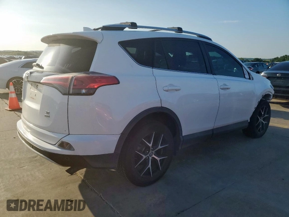 2016 Toyota RAV4 SE with VIN 2T3JFREV2GW456003, listed as a Copart auction lot 64136325 with 133,746 mi miles and Salvage title. Bid and sale history available at DreamBid. Image 3.