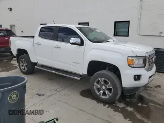 2018 GMC Canyon 4WD Denali with VIN 1GTP6EE12J1257877, listed as a Copart auction lot 49248715 with 59,602 mi miles and Salvage Title. Bid and sale history available at carsss.com. Image 4.