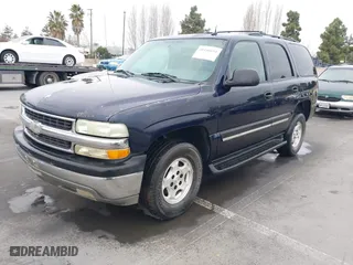 2004 Chevrolet Tahoe LS with VIN 1GNEC13T64J195165, listed as a IAAI auction lot 41446654 with 351,992 mi miles. Bid and sale history available at carsss.com. Image 2.