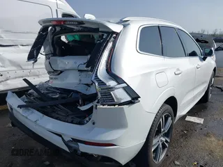 2019 Volvo XC60 Momentum with VIN LYV102DK0KB219297, listed as a IAAI auction lot 41781458 with 80,524 mi miles and . Bid and sale history available at DreamBid. Image 4.