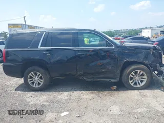 2016 Chevrolet Tahoe LS z VIN 1GNSKAKC7GR409402, wystawiony jako IAAI lot #42594767 z przebiegiem 210 315 mil mil oraz . Historia ofert i sprzedaży dostępna na DreamBid. Obrazek 13.