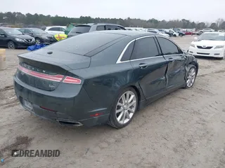 2015 Lincoln MKZ Hybrid with VIN 3LN6L2LU5FR600318, listed as a IAAI auction lot 41554230 with 179,935 mi miles. Bid and sale history available at carsss.com. Image 4.