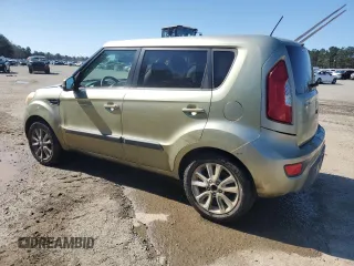 2012 Kia Soul + with VIN KNDJT2A62C7380156, listed as a Copart auction lot 48112215 with 214,993 mi miles and Salvage Title. Bid and sale history available at DreamBid. Image 2.