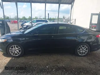 2013 Ford Fusion SE z VIN 3FA6P0H74DR121844, wystawiony jako IAAI lot #42192590 z przebiegiem 243 433 mil mil oraz . Historia ofert i sprzedaży dostępna na DreamBid. Obrazek 14.