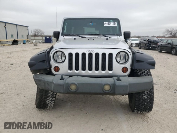 2009 Jeep Wrangler Unlimited Rubicon with VIN 1J8GA69169L731787, listed as a Copart auction lot 44604125 with 180,861 mi miles and Salvage title. Bid and sale history available at DreamBid. Image 5.