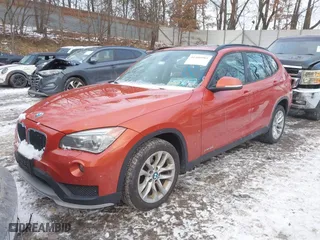 2015 BMW X1 xDrive28i with VIN WBAVL1C51FVY33650, listed as a IAAI auction lot 41400985 with 132,484 mi miles. Bid and sale history available at carsss.com. Image 2.