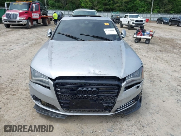 2011 Audi A8 z VIN WAUAVAFD7BN006743, wystawiony jako IAAI lot #42278486 z przebiegiem Nie podano mil oraz . Historia ofert i sprzedaży dostępna na DreamBid. Obrazek 6.