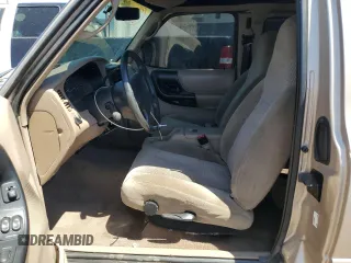 1998 Ford Ranger XL with VIN 1FTZR15X2WPB03820, listed as a Copart auction lot 60717595 with 202,801 mi miles and Salvage title. Bid and sale history available at DreamBid. Image 7.