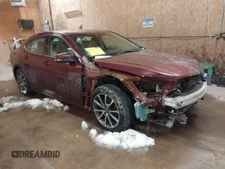 2015 Acura TLX V6 Advance with VIN 19UUB3F70FA010680, listed as a IAAI auction lot 41609571 with 123,004 mi miles. Bid and sale history available at carsss.com. Image 1.