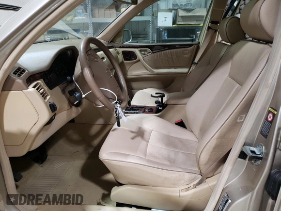 2001 Mercedes-Benz E-Class AWD with VIN WDBJF82J71X043474, listed as a Copart auction lot 45512025 with 59,571 mi miles and Salvage Title. Bid and sale history available at carsss.com. Image 7.