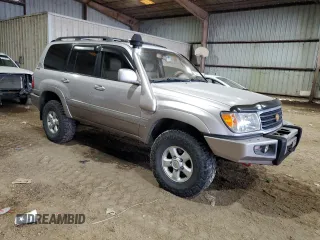 1999 Toyota Land Cruiser with VIN JT3HT05J2X0049288, listed as a Copart auction lot 42304455 with 255,285 mi miles and Salvage Title. Bid and sale history available at carsss.com. Image 4.