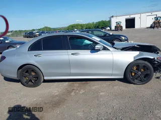 2020 Mercedes-Benz E 350 with VIN WDDZF8EB4LA703331, listed as a IAAI auction lot 42297055 with Not provided miles and . Bid and sale history available at DreamBid. Image 13.