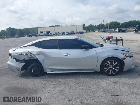 2016 Nissan Maxima SL with VIN 1N4AA6AP0GC433932, listed as a IAAI auction lot 41897180 with 91,871 mi miles and . Bid and sale history available at DreamBid. Image 14.